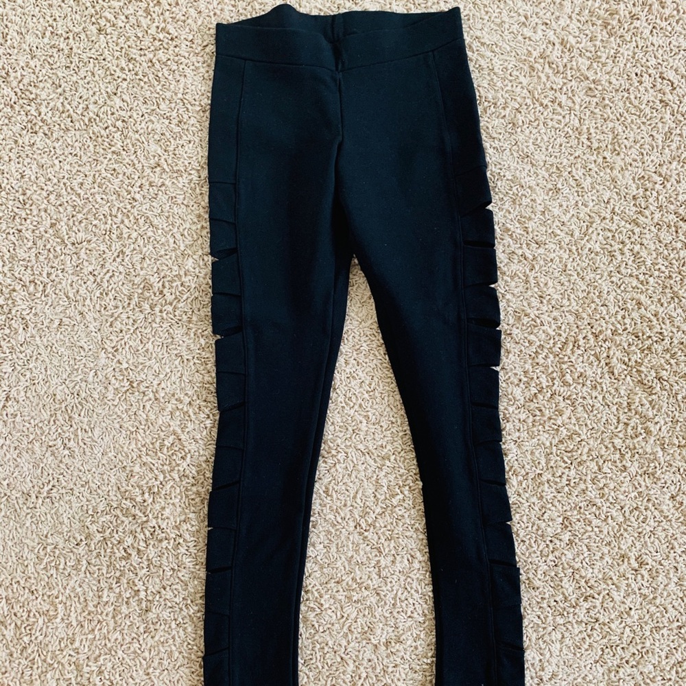 Bebe black stretch “ripped” leggings